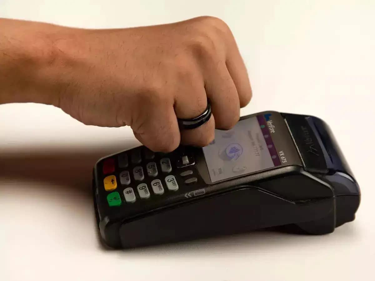 When FinTech Meets Biometric Wearables for Walletless Transactions